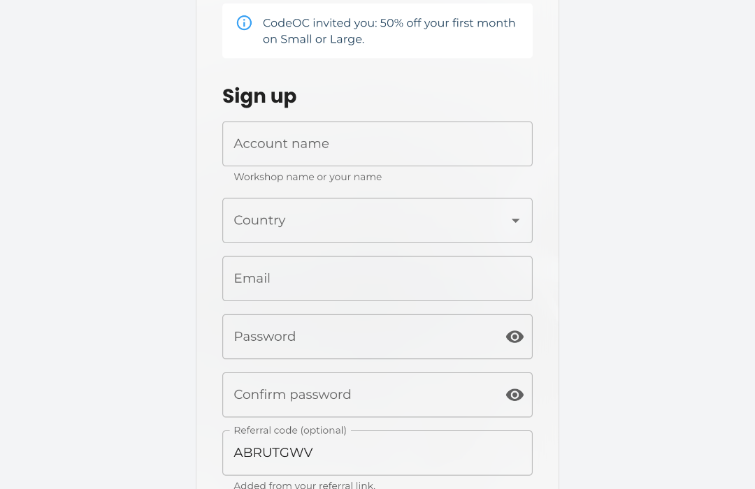 The sign-up page opened from a referral link: the invitation message and the referral code already filled in